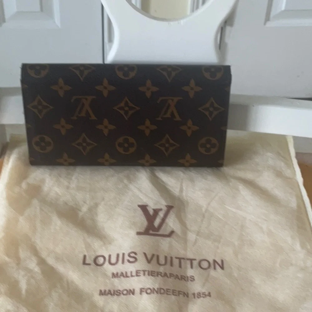 LVBrown Monogram Canvas Continental Wallet - Picture 3 of 7